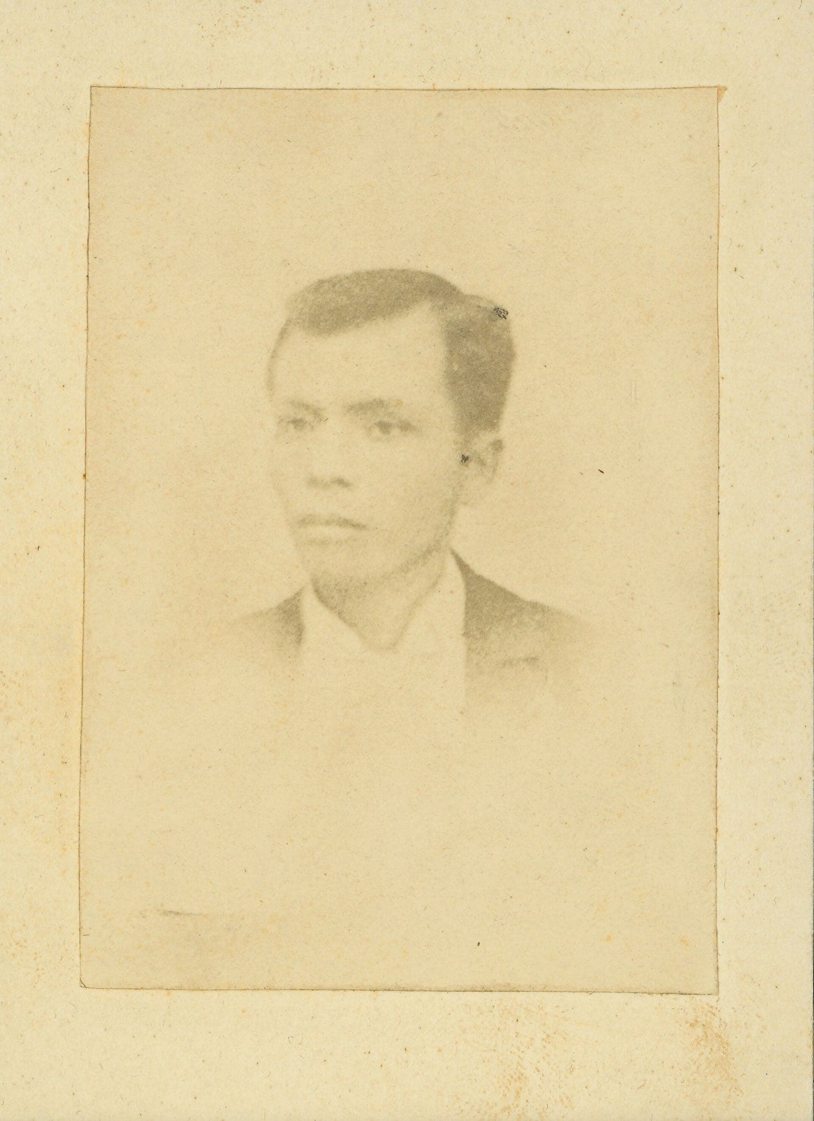 The only surviving photograph of Andres Bonifacio, a faded 1890s studio portrait on a cream card mount