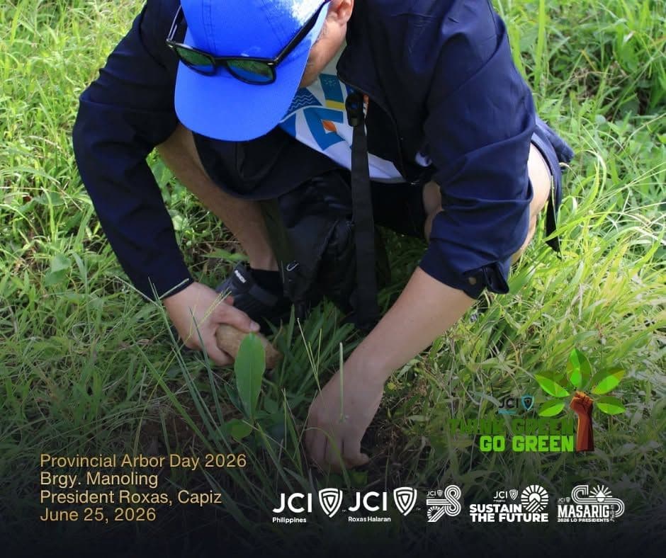 A volunteer planting a sapling in Brgy. Manoling, President Roxas, on Provincial Arbor Day 2026