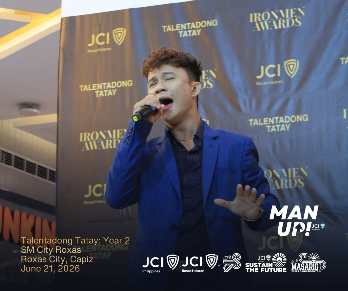 A father singing on stage at Talentadong Tatay 2026, SM City Roxas